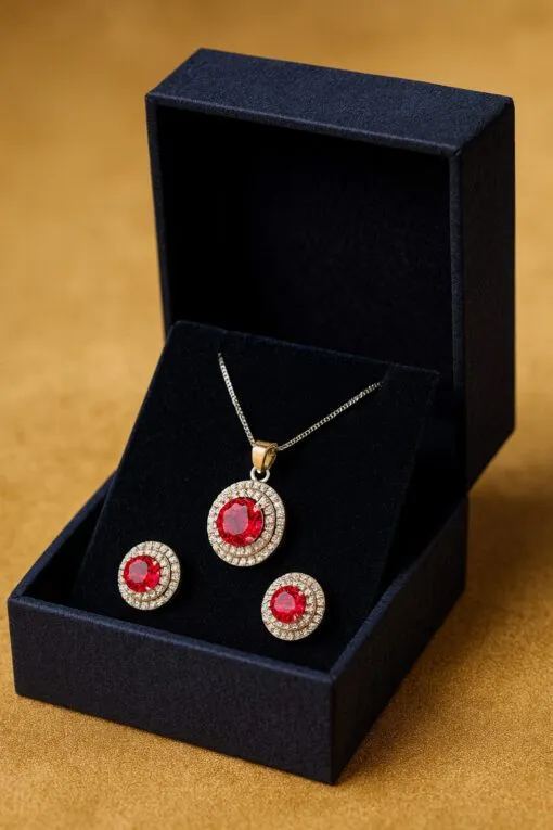 Parure collana e orecchini in argento e zirconi colorati rubino